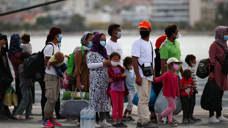 Migranti in attesa sull'isola di Lesbo, Grecia. Foto: Reuters