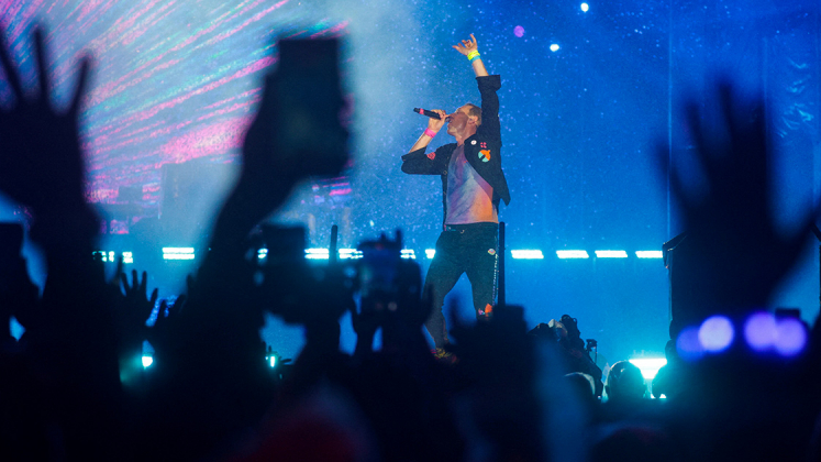 Il frontman e cantante dei Coldplay durante un concerto. Foto: Reuters